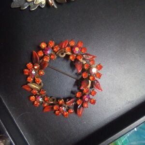 Austria signed red glass brooch